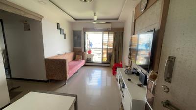 Living Room Image of 830 Sq.ft 2 BHK Apartment / Flat for sale in PNK Poonam Sagar Complex, Mira Road East Mira Bhayandar for Rs. 12200000