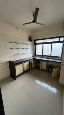Kitchen Image of 723 Sq.ft 2 BHK Apartment / Flat for rent in Kanakia Samarpan, Borivali East Mumbai for Rs. 52000