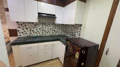 Kitchen Image of 400 Sq.ft 1 RK Independent House for rent in DLF Phase 3 Gurgaon for Rs. 19500