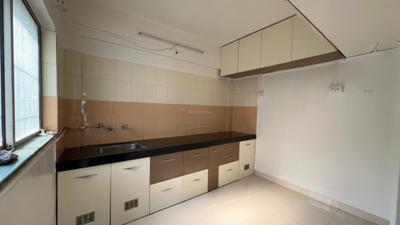 Kitchen Image of 610 Sq.ft 1 BHK Apartment / Flat for sale in Green Woods, Dhayari Pune for Rs. 3500000