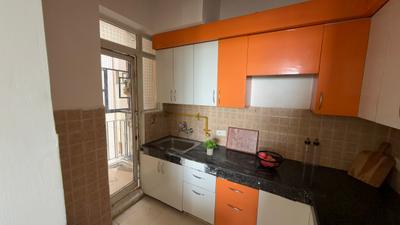Kitchen Image of 973 Sq.ft 2 BHK Apartment / Flat for sale in Aditya Luxuria Estate, Bamheta Village Ghaziabad for Rs. 7000000