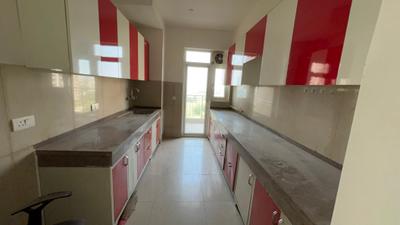 Kitchen Image of 1719 Sq.ft 3 BHK Apartment / Flat for rent in Emaar Palm Gardens, Sector 83 Gurgaon for Rs. 40000