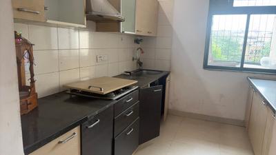 Kitchen Image of 990 Sq.ft 2 BHK Apartment / Flat for rent in R W Devashree Park, Thane West Thane for Rs. 36000