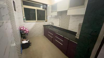 Kitchen Image of 750 Sq.ft 1 BHK Apartment / Flat for rent in Mohan Willows, Badlapur East Badlapur for Rs. 9000