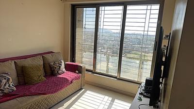 Living Room Image of 630 Sq.ft 1 BHK Apartment / Flat for sale in Vishesh Balaji Symphony Wing I to K, Shilottar Raichur Navi Mumbai for Rs. 5800000