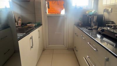 Kitchen Image of 1050 Sq.ft 2 BHK Apartment / Flat for rent in Sampigehalli Bengaluru for Rs. 31000