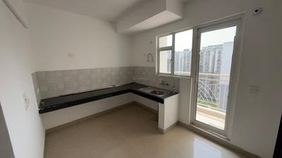 Kitchen Image of 840 Sq.ft 2 BHK Apartment / Flat for rent in Aditya Urban Homes Phase 1A, Bamheta Village Ghaziabad for Rs. 12000