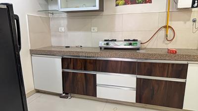 Kitchen Image of 1080 Sq.ft 2 BHK Apartment / Flat for rent in Adani The Meadows, Shantigram Ahmedabad for Rs. 34999