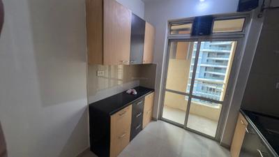 Kitchen Image of 900 Sq.ft 1 BHK Apartment / Flat for rent in Hiranandani Flora, Hiranandani Estate Thane for Rs. 33000