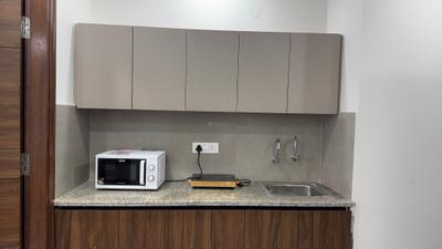Kitchen Image of 1050 Sq.ft 1 BHK Builder Floor for rent in DLF Phase 3 Gurgaon for Rs. 37500