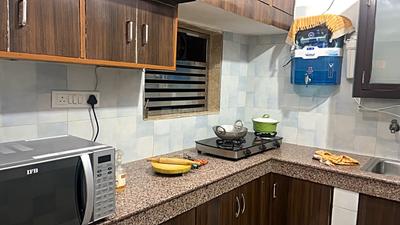 Kitchen Image of 600 Sq.ft 1 BHK Builder Floor for rent in Palam Vihar Gurgaon for Rs. 23000