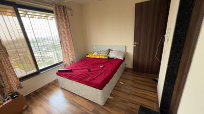 Bedroom Image of 805 Sq.ft 2 BHK Apartment / Flat for rent in Thakurli Thane for Rs. 21000