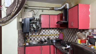 Kitchen Image of 650 Sq.ft 2 BHK Builder Floor for sale in Ramesh Nagar New Delhi for Rs. 5900000