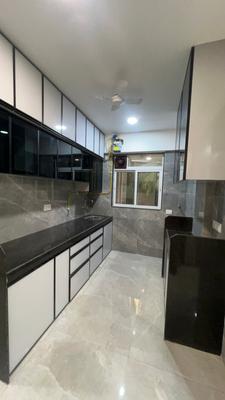 Kitchen Image of 800 Sq.ft 2 BHK Apartment / Flat for sale in Dharti Lotus Arshabharat, Goregaon West Mumbai for Rs. 21000000