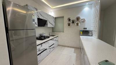 Kitchen Image of 650 Sq.ft 2 BHK Apartment / Flat for sale in Raunak Centrum, Chembur Mumbai for Rs. 15800000