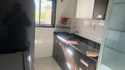 Kitchen Image of 650 Sq.ft 2 BHK Apartment / Flat for rent in Radha Kunj, Malad East Mumbai for Rs. 60000