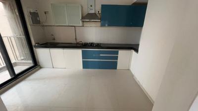 Kitchen Image of 1050 Sq.ft 2 BHK Apartment / Flat for rent in Long Island, Charholi Budruk Pune for Rs. 24000