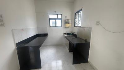 Kitchen Image of 900 Sq.ft 2 BHK Apartment / Flat for sale in Magarpatta Grevillea, Magarpatta City Pune for Rs. 12500000