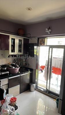Kitchen Image of 825 Sq.ft 1.5 BHK Apartment / Flat for sale in AMMBER ENNCLAVE, Thakurli Thane for Rs. 7000000