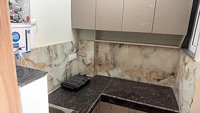 Kitchen Image of 550 Sq.ft 1 RK Apartment / Flat for rent in Sector 43 Gurgaon for Rs. 20000