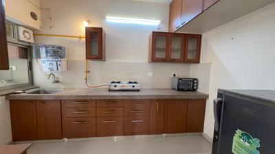 Kitchen Image of 1080 Sq.ft 2 BHK Apartment / Flat for rent in Adani The Meadows, Shantigram Ahmedabad for Rs. 35000