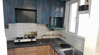 Kitchen Image of 1040 Sq.ft 2 BHK Apartment / Flat for sale in Gaurs Atulyam, Omicron I Greater Noida for Rs. 9200000