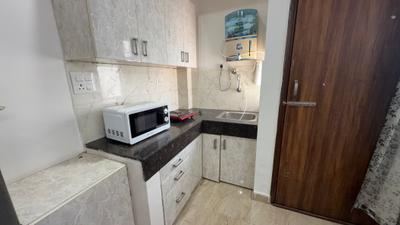Kitchen Image of 855 Sq.ft 1 RK Builder Floor for rent in Suncity Township, Sector 54 Gurgaon for Rs. 24000