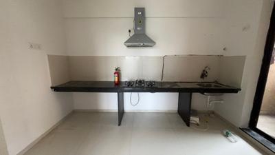 Kitchen Image of 900 Sq.ft 2 BHK Apartment / Flat for rent in Pride Kingsbury Phase I, Charholi Budruk Pune for Rs. 26000