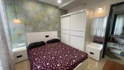Bedroom Image of 730 Sq.ft 1.5 BHK Builder Floor for rent in Amanora Future Towers, Hadapsar Pune for Rs. 40000