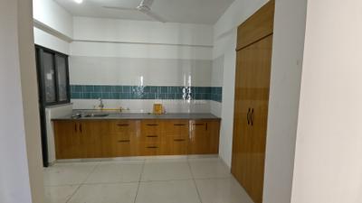 Kitchen Image of 1400 Sq.ft 3 BHK Apartment / Flat for rent in Vishwanath Maher Select, Shela Ahmedabad for Rs. 25500