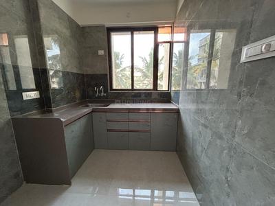 Kitchen Image of 697 Sq.ft 1 BHK Apartment / Flat for rent in Pragati Om Gulmohar, Dombivli East Thane for Rs. 16000