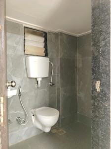 Common Bathroom Image of 670 Sq.ft 1 BHK Apartment / Flat for sale in RNA NG Platinum City, Vasai East Vasai for Rs. 3800000