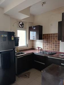 Kitchen Image of 900 Sq.ft 2.5 BHK Apartment / Flat for sale in Amrapali Zodiac, Sector 120 Noida for Rs. 9500000