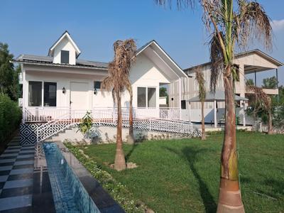 Building Image of 1500 Sq.ft 3 BHK Villa for sale in Dkrrish Green Beauty Farms, Kidawali Noida for Rs. 8500000