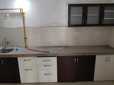 Kitchen Image of 1080 Sq.ft 2 BHK Apartment / Flat for sale in Adani The Meadows, Shantigram Ahmedabad for Rs. 7100000