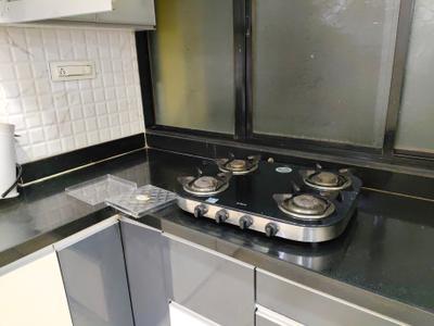 Kitchen Image of 1060 Sq.ft 2 BHK Apartment / Flat for rent in Kalash Vastushree, Katraj Pune for Rs. 23000