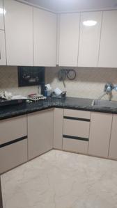 Kitchen Image of 550 Sq.ft 1.5 BHK Apartment / Flat for sale in Sector 62A Noida for Rs. 3800000