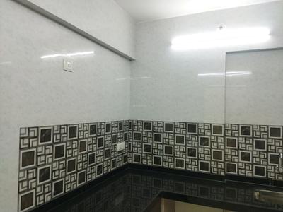 Kitchen Image of 700 Sq.ft 1 BHK Apartment / Flat for sale in Happy Home Sarvoday Symphony, Thakurli Thane for Rs. 5500000