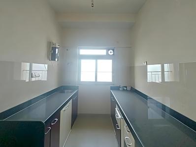 Kitchen Image of 952 Sq.ft 2 BHK Apartment / Flat for rent in Rustomjee Urbania Acura, Thane West Thane for Rs. 37999