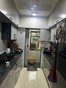 Kitchen Image of 950 Sq.ft 2 BHK Apartment / Flat for rent in Centrio Nx By Mj Shah, Chedda Nagar Mumbai for Rs. 70000