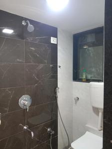 Common Bathroom Image of 980 Sq.ft 2 BHK Apartment / Flat for sale in Bhagwati Belmont, Kasarvadavali Thane for Rs. 9400000