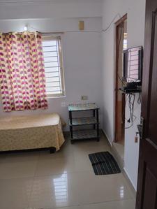 Bedroom Image of Athithi Ladies PG in Adugodi, Bangalore