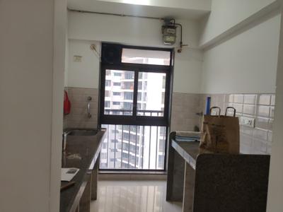 Kitchen Image of 701 Sq.ft 1 BHK Apartment / Flat for sale in Parinee Essence, Kandivali West Mumbai for Rs. 9500000