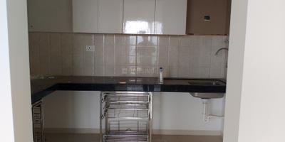 Kitchen Image of 950 Sq.ft 2 BHK Apartment / Flat for sale in Shapoorji Pallonji Sensorium Phase I, Maan Pune for Rs. 8500000