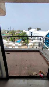 Balcony Image of 710 Sq.ft 1 BHK Apartment / Flat for sale in Tharwani Vedant Millenia Happiness, Titwala Thane for Rs. 2600000