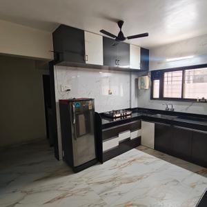 Kitchen Image of 1050 Sq.ft 2 BHK Apartment / Flat for rent in Chikhali Pune for Rs. 25000