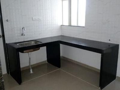 Kitchen Image of 695 Sq.ft 2 BHK Apartment / Flat for sale in Cozy Homes, Wagholi Pune for Rs. 4500000
