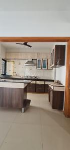 Kitchen Image of 1575 Sq.ft 3 BHK Apartment / Flat for sale in Shree Ami Infrastructure Pearl Apartments, Shyamal Ahmedabad for Rs. 9500000