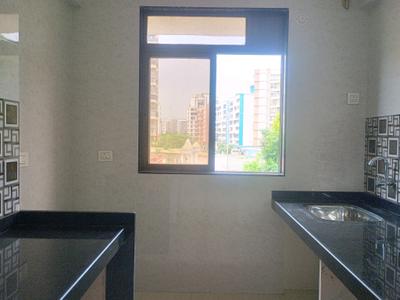 Kitchen Image of 720 Sq.ft 1 BHK Apartment / Flat for sale in Rkr Precious Empire Wing A B And C, Ambernath East Ambernath for Rs. 2500000