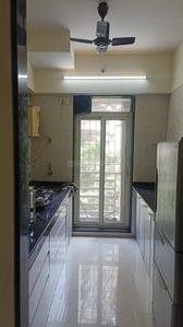 Kitchen Image of 945 Sq.ft 2 BHK Apartment / Flat for rent in RDC Pinewood, Kasarvadavali Thane for Rs. 33000